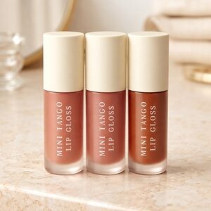 Lip Gloss-Set of 3-NEW. 3 DIFFERERNT COLORS